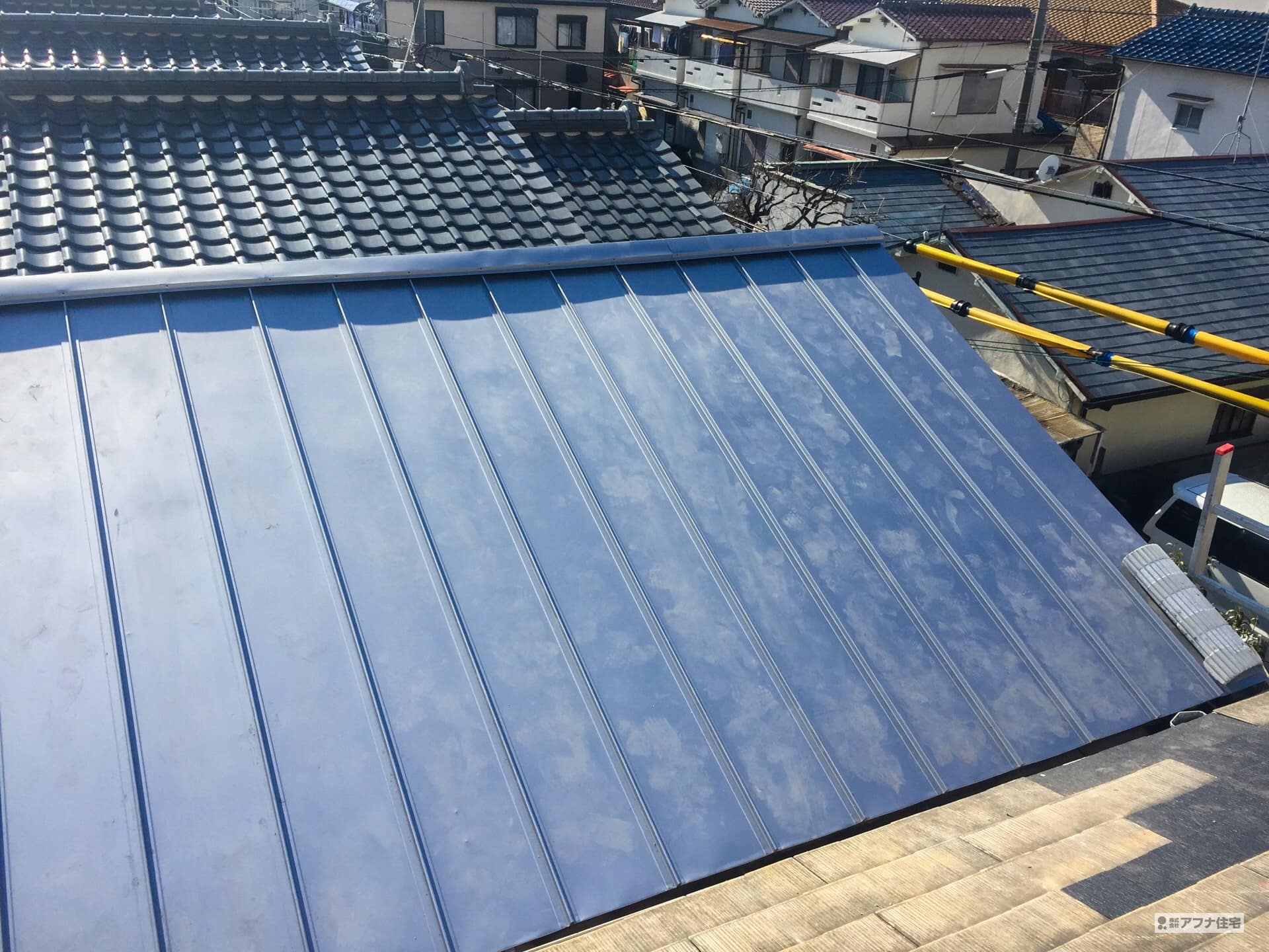 アフナ住宅|屋根葺き替え工事(ガルバリウム鋼板)事例写真